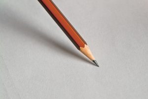 pencil nib on blank piece of paper