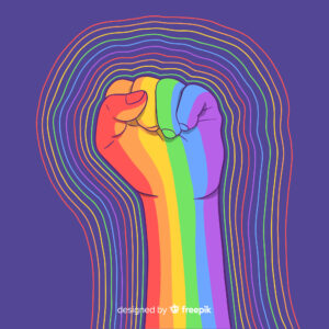 Image of fist indicating strength in rainbow colours for coming out article