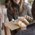 Donating food items in a box