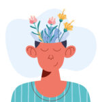 Boy smiling with flowers growing from his head