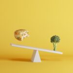 broccoli vegetable tipping seesaw depicting eating disorders