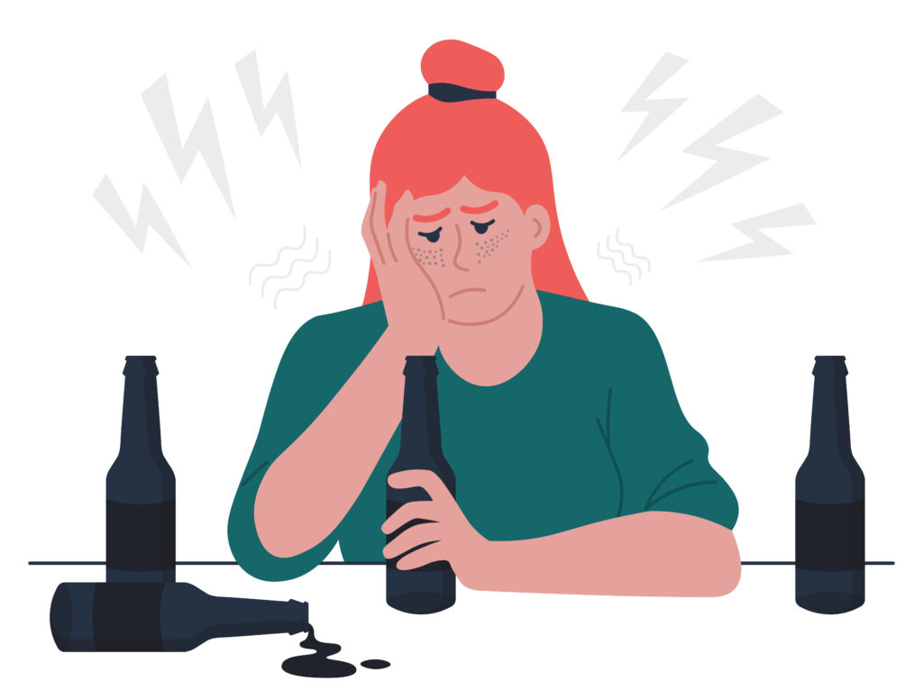 Cartoon picture of a girl with orange hair sitting down at a table with dark glass bottles looking sad. 