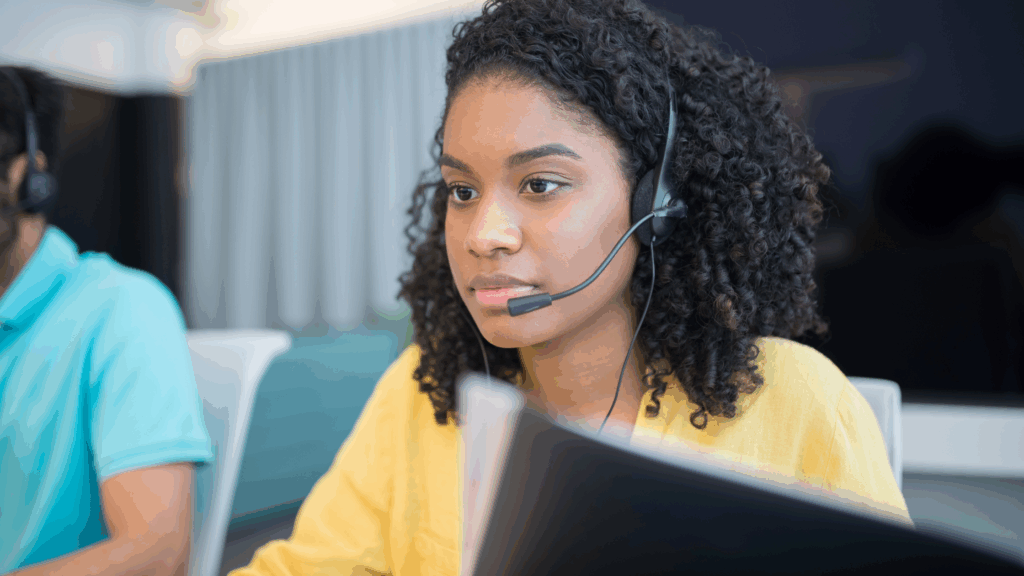 Helpline advisor wearing a headset to talk to a caller
