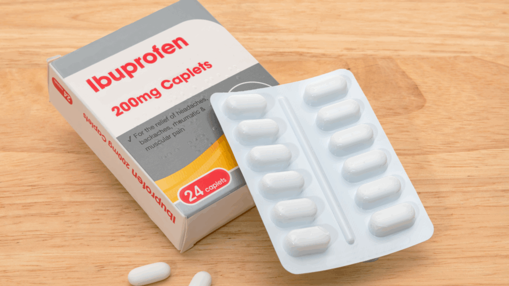 Ibuprofen packet and tablets on a table
